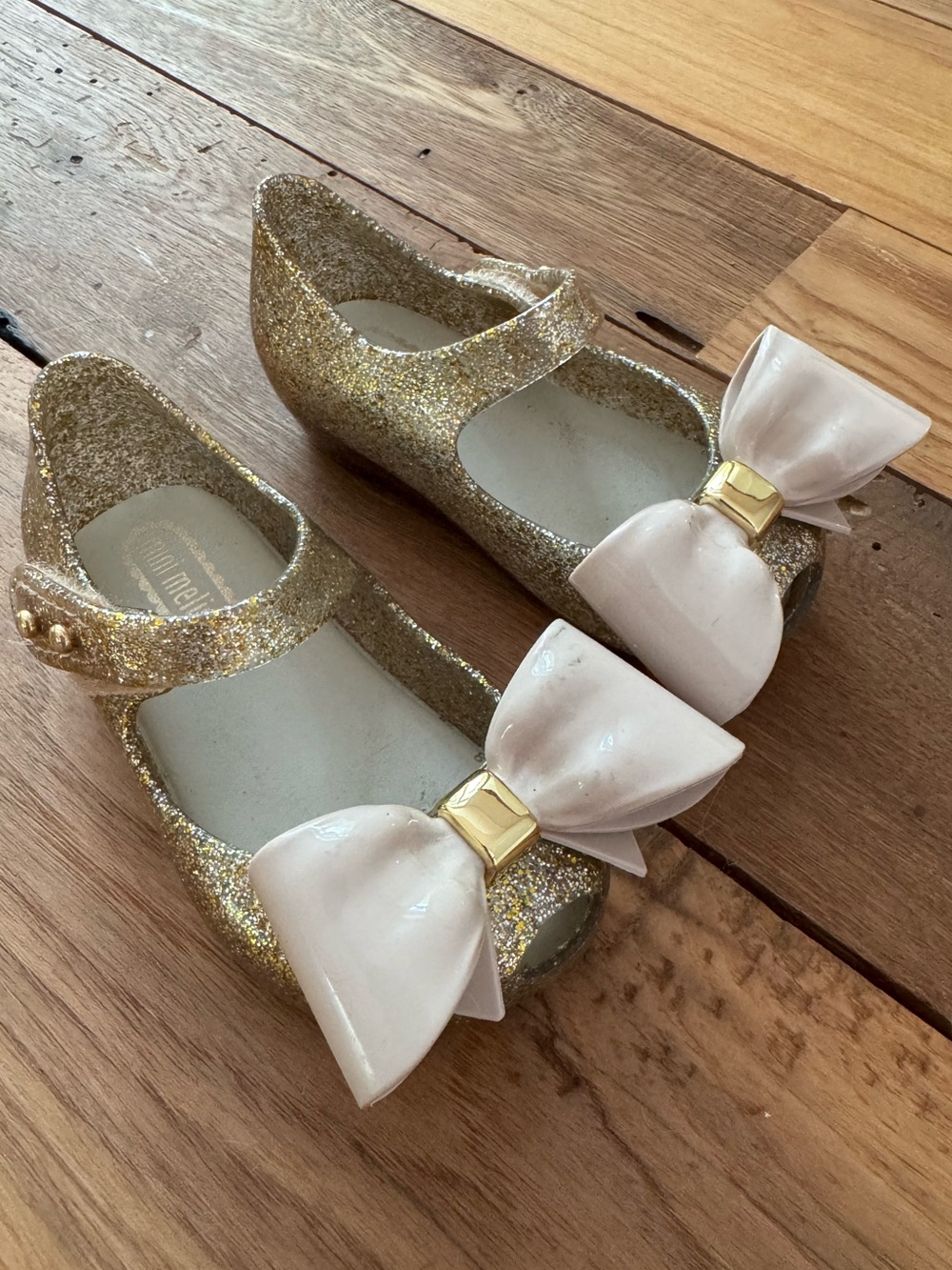 Mini Melissa Gold Glitter Mary Jane Shoes with White Bows